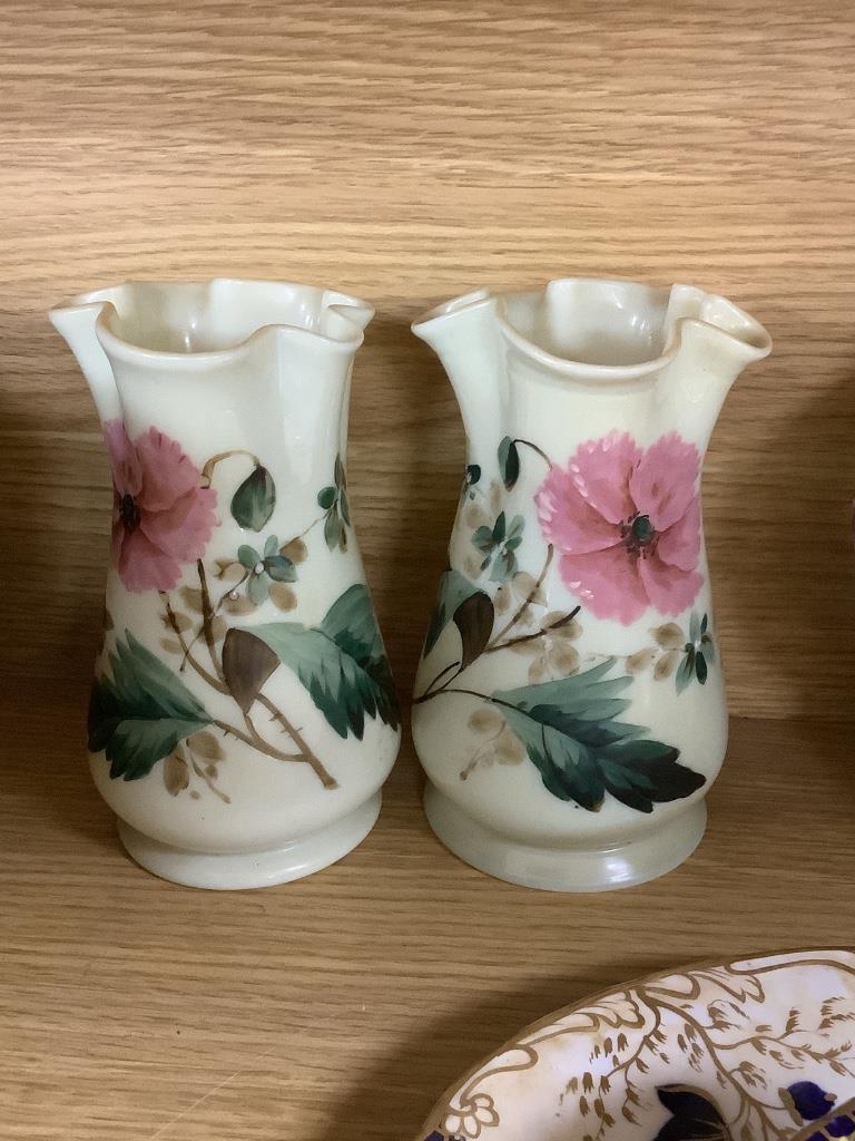 A Rockingham part teaset, c.1835, two glass paperweights, two glass vases and a French garlic neck vase